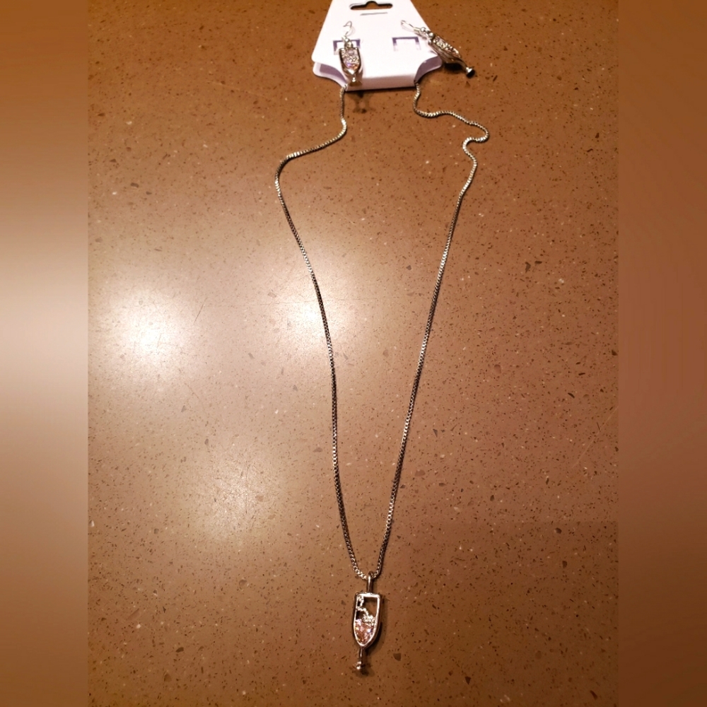 Silver necklace set with champagne glasses